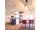 Open concept kitchen and dining area with modern design and neutral color palette at 37711 W Pierce St, Tonopah, AZ 85354