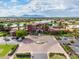 Aerial view of resort amenities, including water feature, clubhouse, and parking at 42585 W Heavenly Pl, Maricopa, AZ 85138