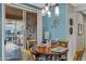 Charming breakfast nook with a round table and view of the backyard at 42585 W Heavenly Pl, Maricopa, AZ 85138