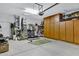 Garage offers ample storage with built-in cabinets at 42585 W Heavenly Pl, Maricopa, AZ 85138