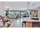 Open concept kitchen with granite island and stainless steel appliances at 42585 W Heavenly Pl, Maricopa, AZ 85138