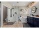 Elegant bathroom with soaking tub, walk-in shower, and modern vanity at 4518 W Hopi Trl, Laveen, AZ 85339