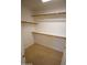 Large walk-in closet with shelving and hanging rods at 4747 E Appleby Ct, Gilbert, AZ 85298