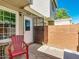 Front entry with a red chair and gate at 510 N Alma School Rd # 237, Mesa, AZ 85201