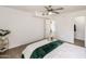 Bright bedroom with a comfortable bed and ceiling fan at 5877 N Granite Reef Rd # 2212, Scottsdale, AZ 85250