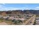 Aerial view of a residential neighborhood nestled in the mountains at 817 E Monte Way, Phoenix, AZ 85042