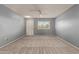 Spacious bedroom with neutral walls and carpet at 9459 N 111Th Ave, Sun City, AZ 85351