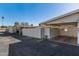 Building exterior showing multiple units and parking at 9459 N 111Th Ave, Sun City, AZ 85351