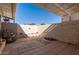 Outdoor patio space with brick walls and a pergola at 9459 N 111Th Ave, Sun City, AZ 85351