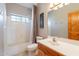 Clean bathroom with shower/tub and wood vanity at 11497 N Sombra Del Monte Rd, Casa Grande, AZ 85194