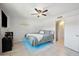 Bedroom with a floating bed, tile floor, and blue accent lighting at 1307 N 44Th St, Phoenix, AZ 85008