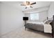 Bedroom with tiled floors, ceiling fan, and a TV stand at 1307 N 44Th St, Phoenix, AZ 85008