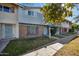 Row of townhouses showcasing a light gray facade and landscaping at 1307 N 44Th St, Phoenix, AZ 85008