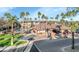 Community view showing clubhouse, pool, and landscaping at 14950 W Mountain View Blvd # 6301, Surprise, AZ 85374