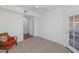 Bedroom with access to patio and built-in shelving at 14950 W Mountain View Blvd # 6301, Surprise, AZ 85374