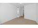 Bright bedroom with neutral carpeting and mirrored closet doors at 14950 W Mountain View Blvd # 6301, Surprise, AZ 85374