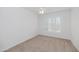 Bright bedroom with ceiling fan and window shutters at 14950 W Mountain View Blvd # 6301, Surprise, AZ 85374