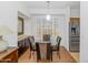 Charming dining area with glass table and kitchen access at 14950 W Mountain View Blvd # 6301, Surprise, AZ 85374