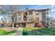 Attractive condo building with landscaping and walkway at 14950 W Mountain View Blvd # 6301, Surprise, AZ 85374