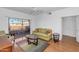 Living room with patio access and comfortable furnishings at 14950 W Mountain View Blvd # 6301, Surprise, AZ 85374