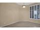 Empty dining room with tile floors and large window with shutters at 16423 S 4Th St, Phoenix, AZ 85048