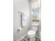 Simple bathroom with toilet and wall-mounted towel rack at 17765 W Silverwood Dr, Goodyear, AZ 85338