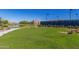 Enjoy community amenities including a lake, lawn games, and clubhouse at 17765 W Silverwood Dr, Goodyear, AZ 85338