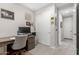 Home office with a desk, chair, and built-in closet at 17765 W Silverwood Dr, Goodyear, AZ 85338