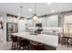 Modern kitchen with island and stainless steel appliances at 17765 W Silverwood Dr, Goodyear, AZ 85338