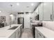 Modern kitchen with white cabinets, stainless steel appliances, and an island at 17765 W Silverwood Dr, Goodyear, AZ 85338