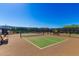Community pickleball courts with seating at 17765 W Silverwood Dr, Goodyear, AZ 85338
