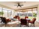 Sunroom with seating area and view of the backyard at 17765 W Silverwood Dr, Goodyear, AZ 85338