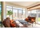 Sunroom with comfortable seating and backyard access at 17765 W Silverwood Dr, Goodyear, AZ 85338