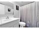 Clean bathroom with a shower/tub combo and vanity at 1920 W Lindner Ave # 130, Mesa, AZ 85202