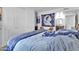 Bright bedroom featuring a comfortable bed and a tapestry on the wall at 1920 W Lindner Ave # 130, Mesa, AZ 85202