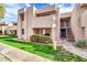 Attractive condo building with landscaping and walkway at 1920 W Lindner Ave # 130, Mesa, AZ 85202