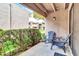 Private patio with seating area and lush greenery at 1920 W Lindner Ave # 130, Mesa, AZ 85202