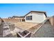 Spacious backyard with gravel landscaping and modern planters at 19436 S 208Th Pl, Queen Creek, AZ 85142