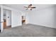Bright bedroom with ceiling fan and carpet flooring at 19436 S 208Th Pl, Queen Creek, AZ 85142