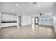 Bright living area with wood-look floors and access to a back patio at 19436 S 208Th Pl, Queen Creek, AZ 85142