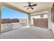 Covered patio with ceiling fan, overlooking the backyard at 19436 S 208Th Pl, Queen Creek, AZ 85142