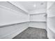 Large walk-in closet with ample shelving and hanging space at 19436 S 208Th Pl, Queen Creek, AZ 85142