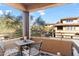 Private balcony with table and chairs, offering scenic views at 20100 N 78Th Pl # 2091, Scottsdale, AZ 85255