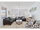 Living room with comfortable seating and a large window at 20100 N 78Th Pl # 2091, Scottsdale, AZ 85255