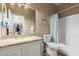 Clean bathroom with a bathtub, shower, and granite vanity at 20472 N 90Th Ln, Peoria, AZ 85382
