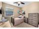 Charming bedroom with a twin bed and plenty of storage at 20472 N 90Th Ln, Peoria, AZ 85382