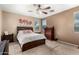 Bedroom with a dresser and a bed at 20472 N 90Th Ln, Peoria, AZ 85382