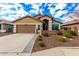 One-story house with a two-car garage and landscaped front yard at 20472 N 90Th Ln, Peoria, AZ 85382