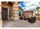 Wicker patio furniture on a paved porch at 20472 N 90Th Ln, Peoria, AZ 85382