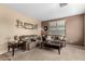 Bright living room featuring two sofas and a coffee table at 20472 N 90Th Ln, Peoria, AZ 85382